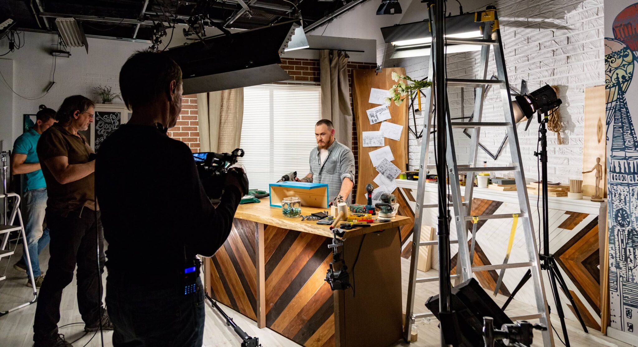 Crew filming a media tour in studio integrated services